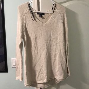 White knit sweater, worn but still nice